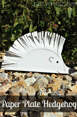 a spiky hedgehog made from kids cutting paper plates