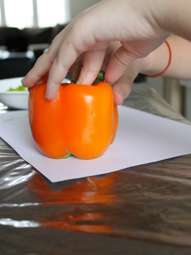 This is a great craft for St Patrick's Day! Making Shamrock stamps with preschoolers out of peppers