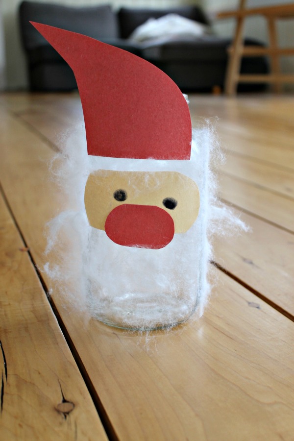 Make a fuzzy Santa mason jar craft! A great preschool craft for Christmas rich in sensory play!