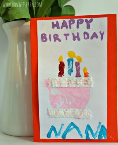 such a sweet homemade birthday card idea - a handprint birthday cake!