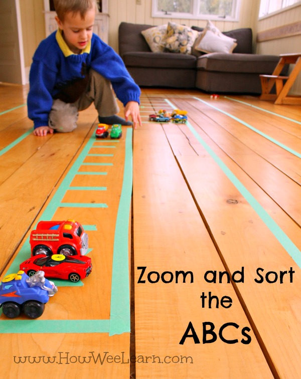 playing with cars and racing to sort the letters is a fun way to practice the abc's!