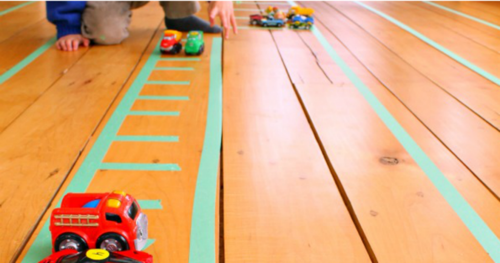 pop some painters tape on the floor for endless play!