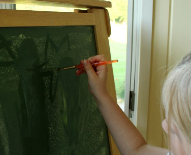 painting with water on chalk is a great mess free activity!