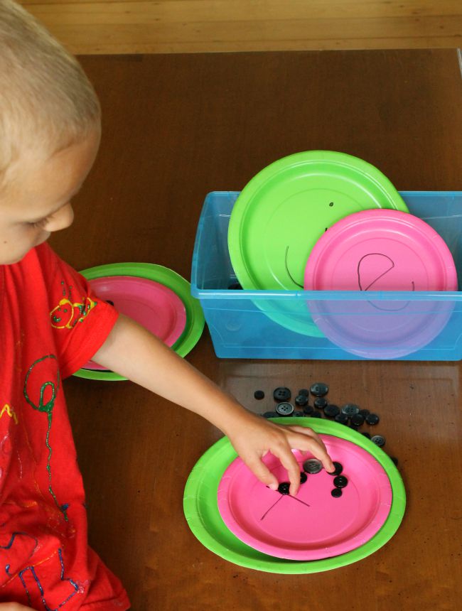 Learn letters with a "watermelon seed" quiet bin activity