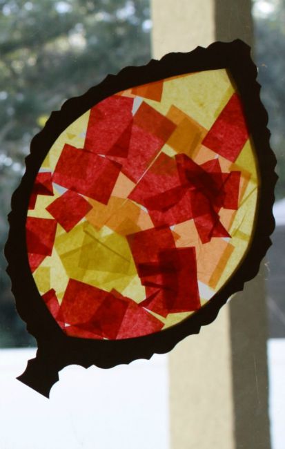 Fall crafts for kids - tissue paper leaf sun catcher