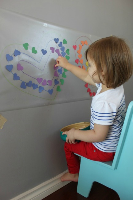 Quiet activities for two year olds - sticky wall color matching