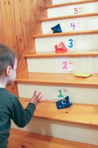 Learn numbers on the stairs with a bean bag toss!