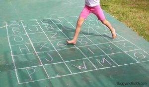 Learning the alphabet this summer - abc chalk game