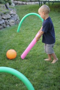 Summer games to play outside - pool noodle hockey