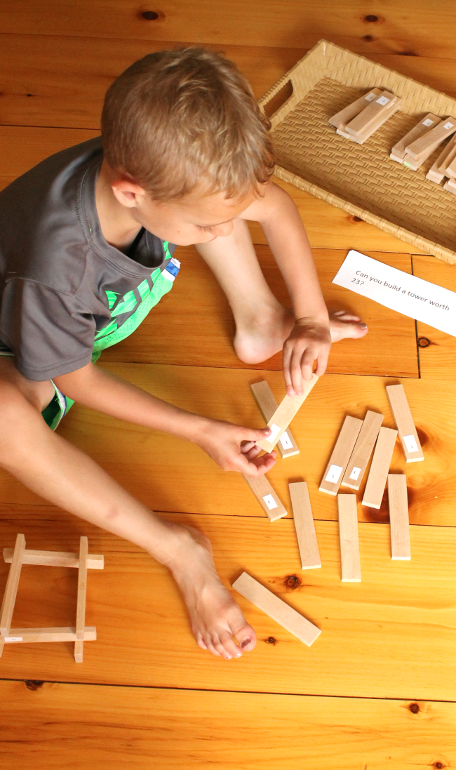 Teach kids about numbers, adding, and subtracting with this fun activity using blocks!