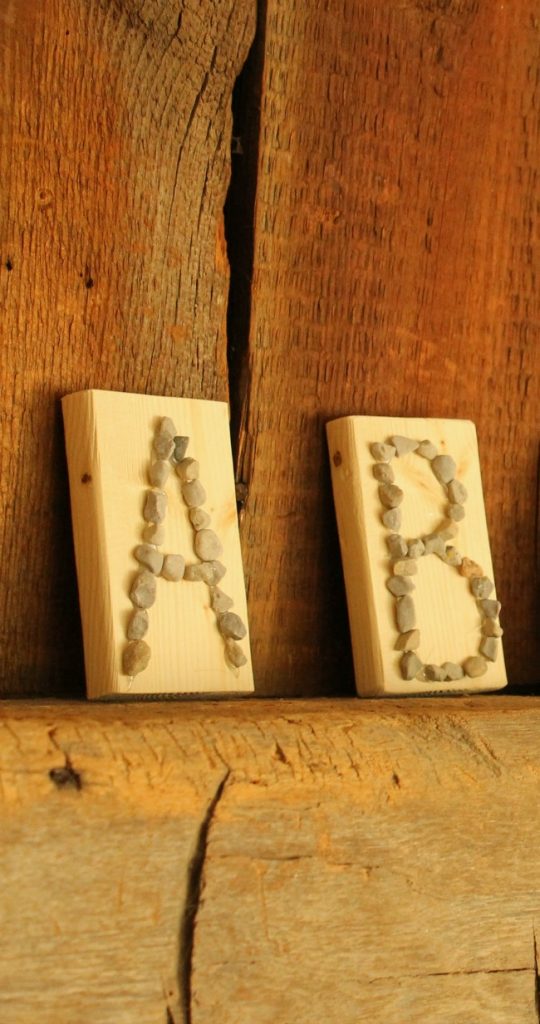 Use pebbles to make a beautiful tactile alphabet. A great way to practice letters and letter formation and the ABCs!