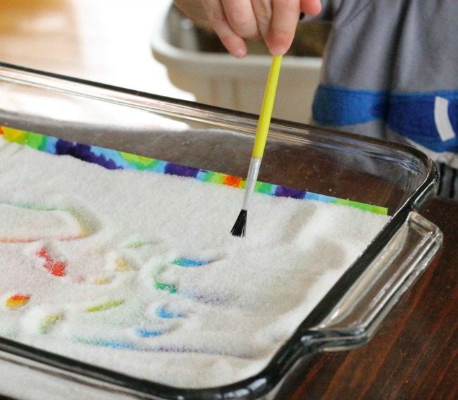 A gorgeous salt tray idea using a preschoolers own painting!
