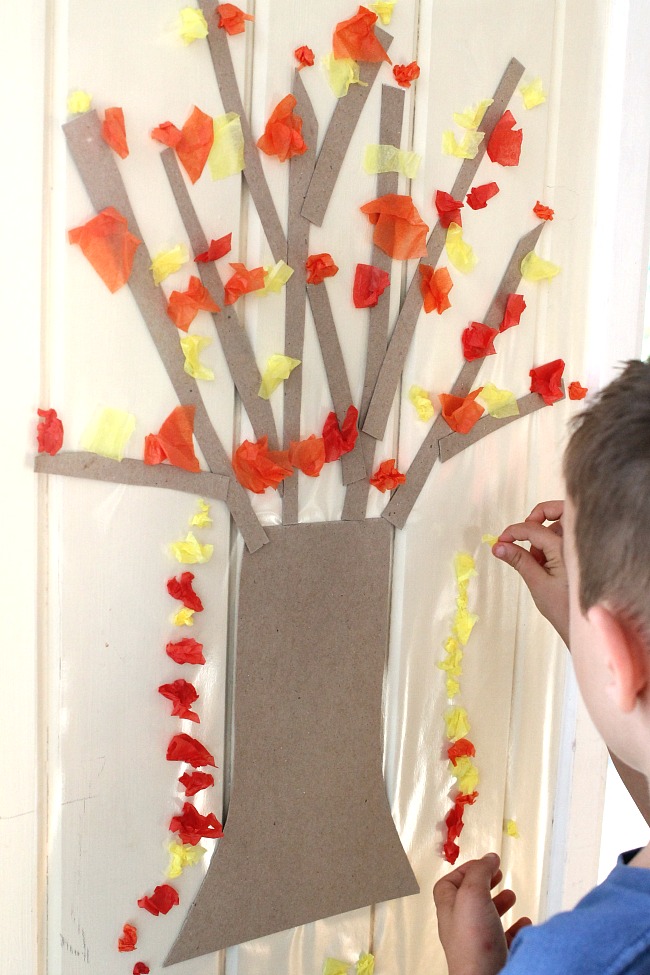 fabulous fall craft ideas for preschoolers - this contact paper tree is awesome for working on fine motor skills and such a cute craft for Autumn