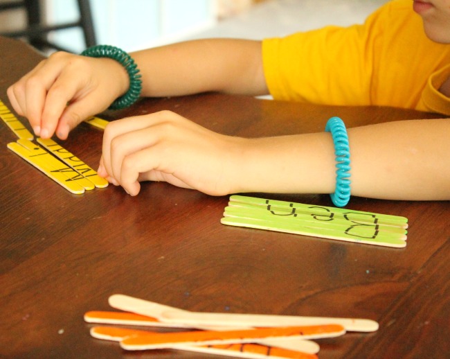 These name puzzles are a great way to learn a name for preschoolers! All you need is popsicle sticks too. #KwikStix #sponsored #preschool #name #letters #learning