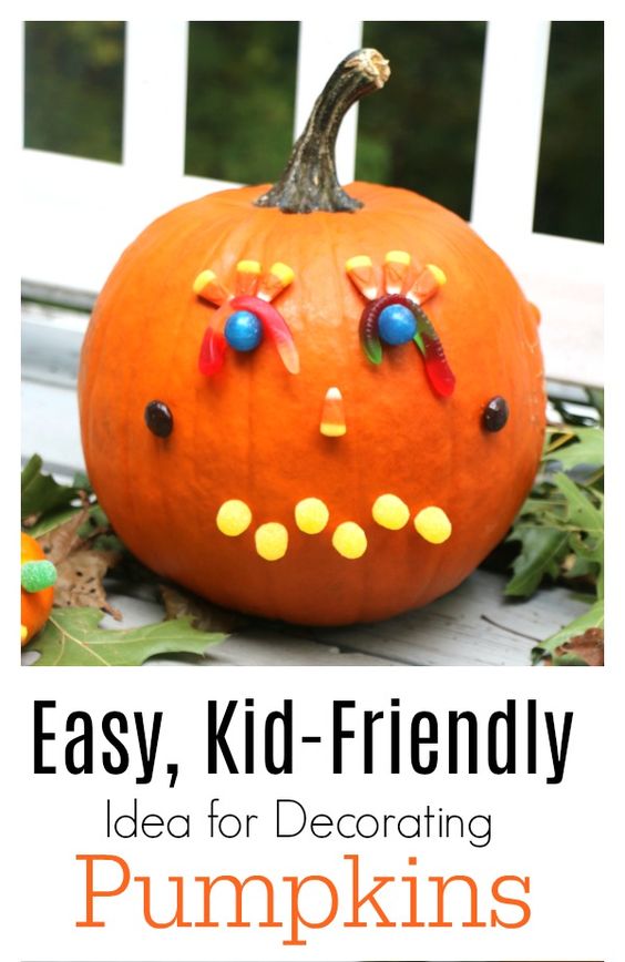 Decorating pumpkins with candy is fun for all ages, even for adults! This could turn into a great game idea for a party! Here is a list of more pumpkin decorating ideas that toddlers, preschoolers and kids of all ages can create! #howweelearn #pumpkincarving #pumpkindecorating #jackolantern # halloween #kidsactivities