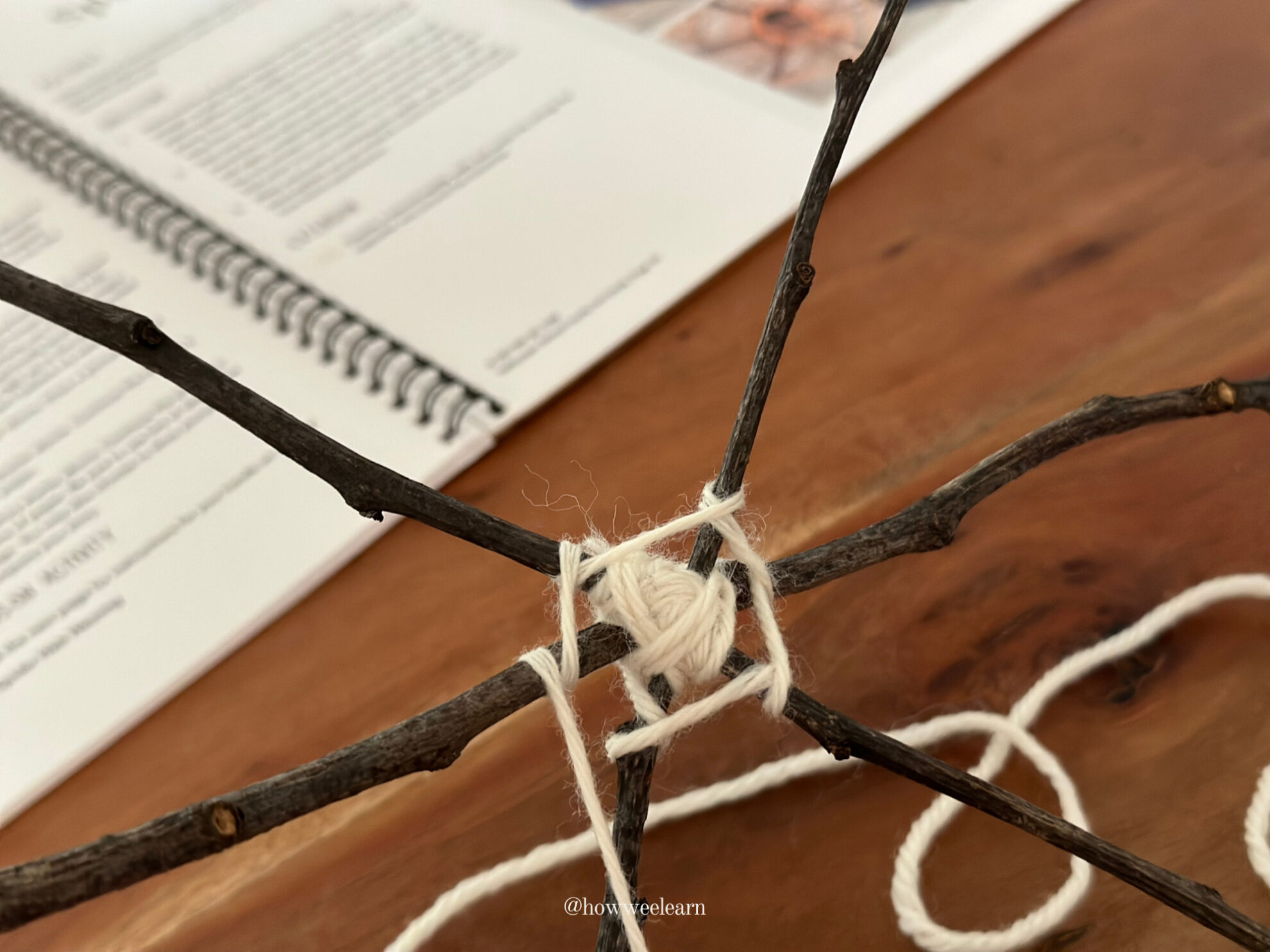 Spider Web Weaving: Wrap the yarn around each stick, moving around each stick in a circle