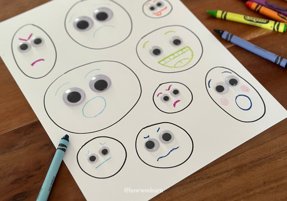 Teaching Feelings and Emotions by drawing faces around googly eyes on a piece of paper
