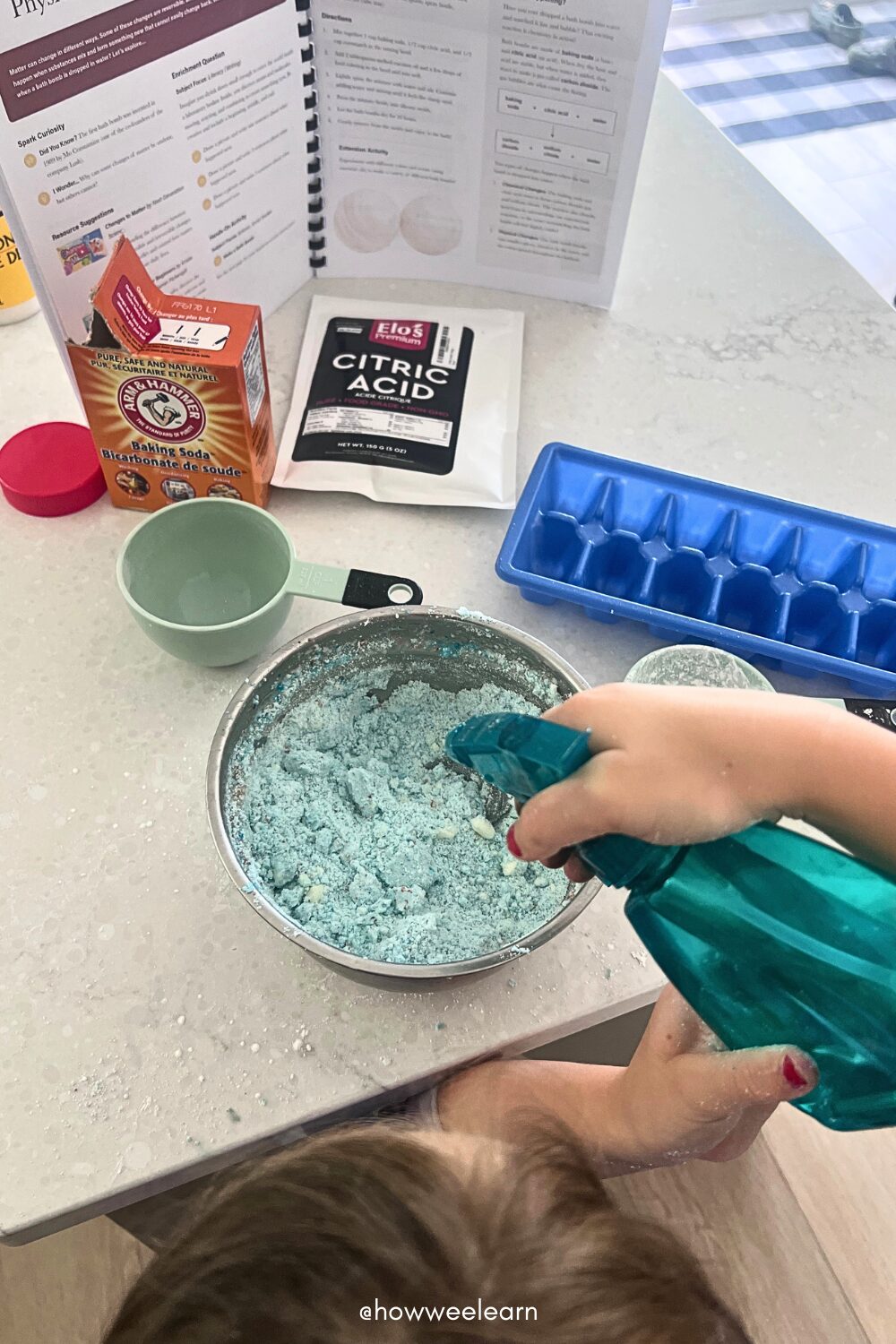 Spraying water into the dry ingredients